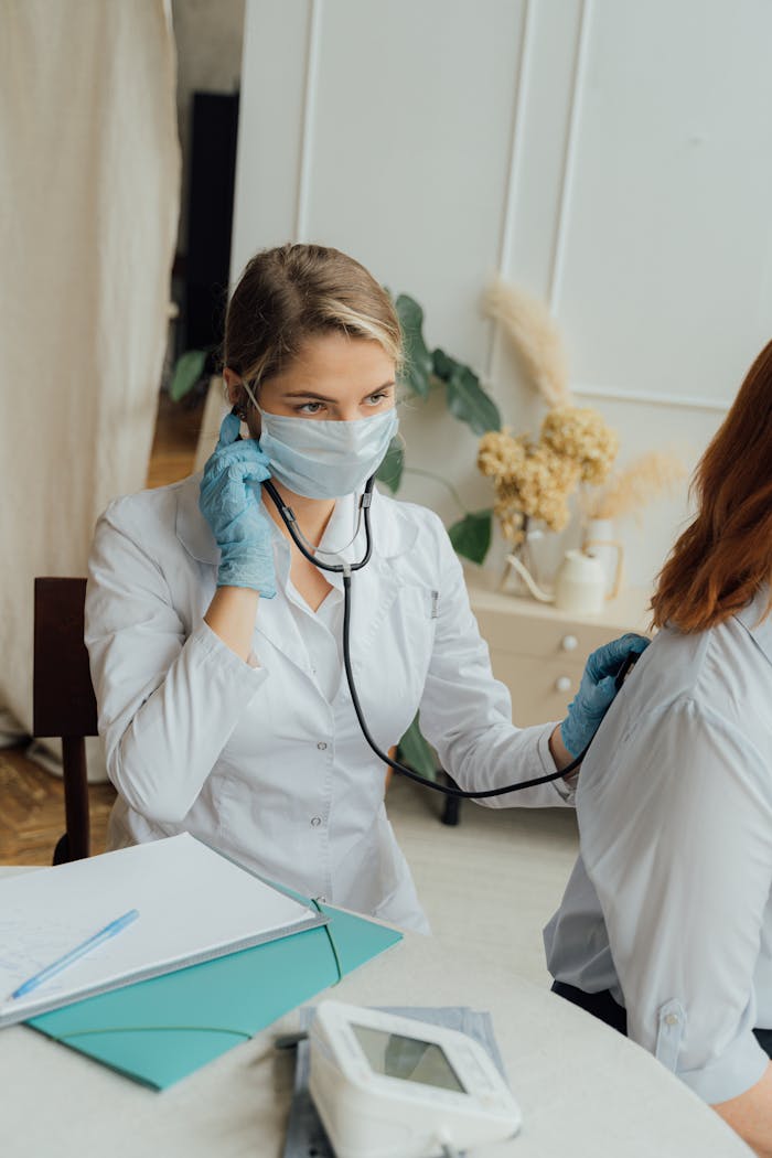 Doctor uses stethoscope on patient